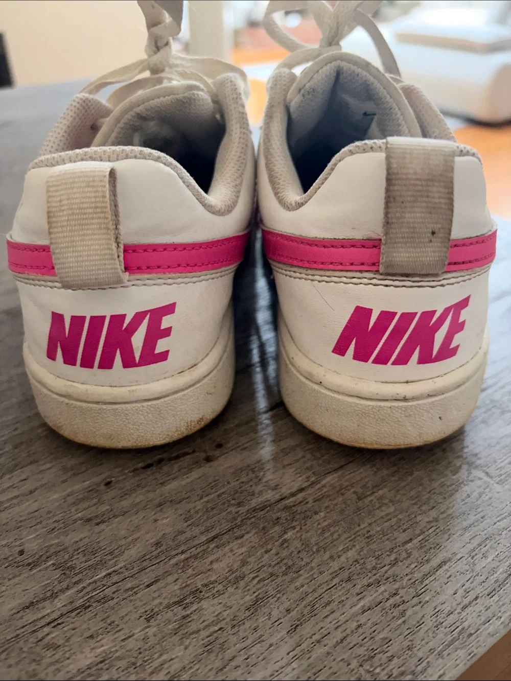 Nike Kids White Sneakers with Pink Swoosh